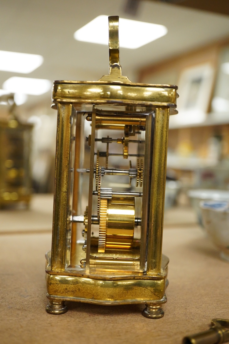 An early 20th century French gilt brass four glass carriage timepiece with key, 15cm high